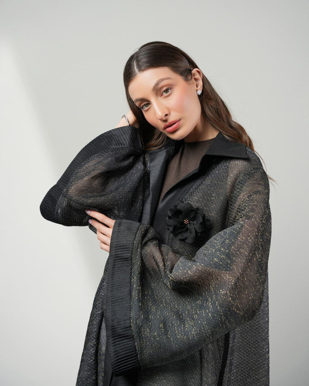 Shine Pleated Abaya in black with a lustrous pleated finish